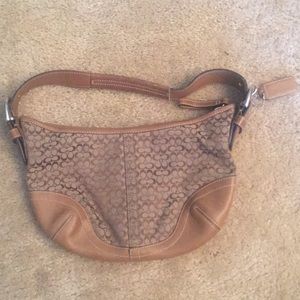 Coach purse. Brown leather. Small.